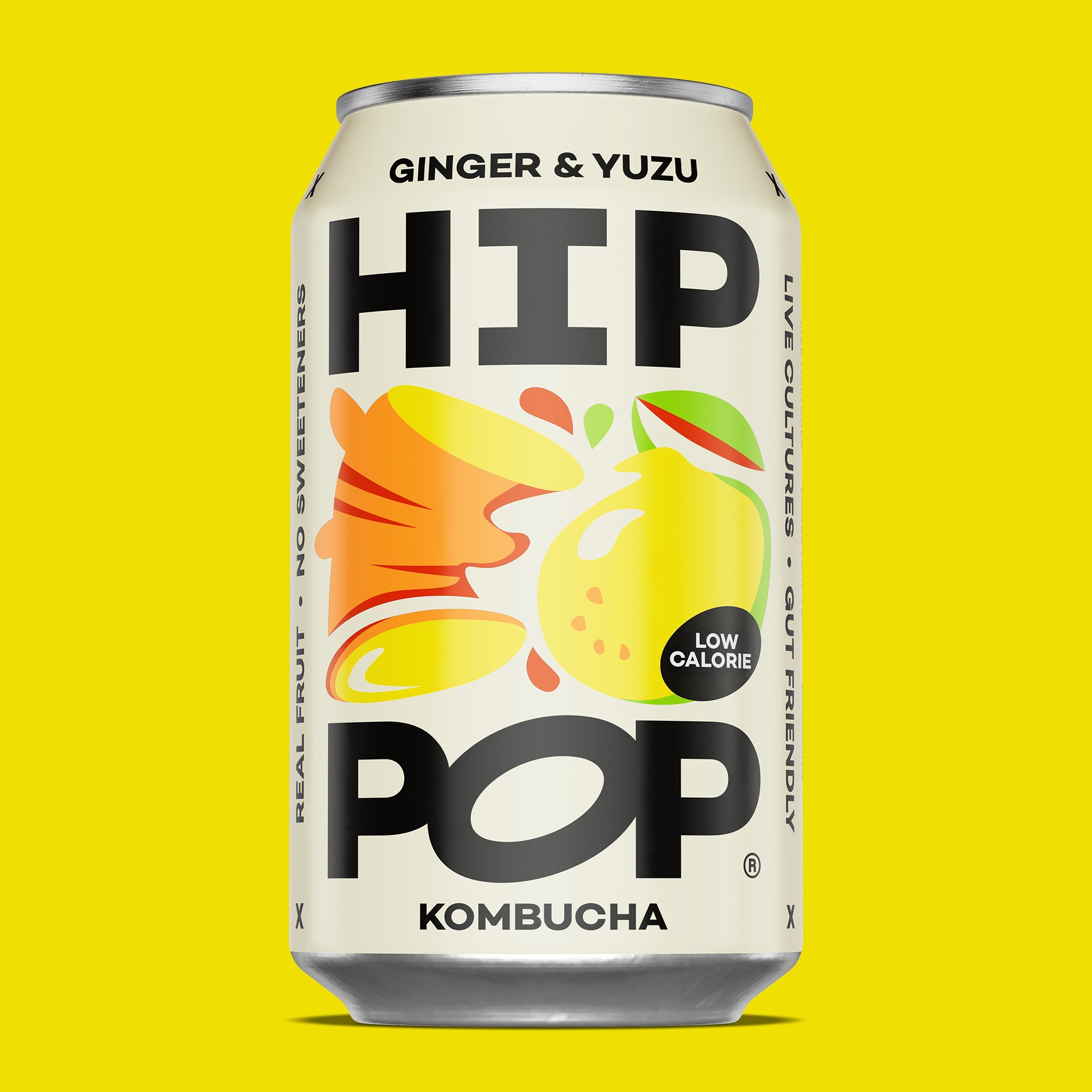 Can of HIP POP Ginger & Yuzu Kombucha on a yellow background