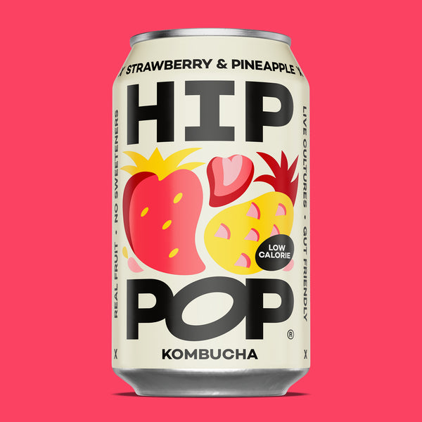 Can of HIP POP Strawberry & Pineapple Kombucha on a pink background